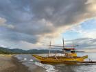 Fishing vessel at sunset
