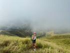 Taking in the views from the summit of a hike