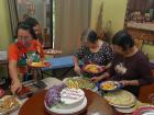 Digging into the dessert table for my host mom's 84th birthday!