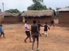 Children in Kauma Village playing football