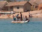 Typical lakefront village - notice how the kids become familiar with the water from a young age as the lake is such a vital part of their sustenance and livelihood