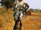 This man may seem tall but he is actually on stilts in a typical Gule Wamkulu costume!