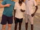 Coach Anderson (middle) is completely soaked from his birthday celebration after tennis practice!