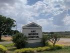 Welcome sign for ABC Mission Hospital which 'ABC' stand for 'African Bible College'