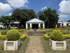 Front view of ABC Mission Hospital whose motto is 'We Treat, God Heals'