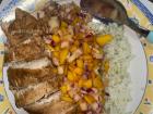 Chicken and rice is a staple here, it's made much better with mango salsa!