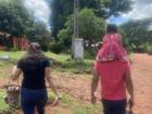 Walking with my host family to their grandmother's farm