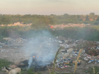 Trash is burned at the dump every day. Animals eat there as well.