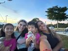 A picture of me, Chelsea (another English teacher), Kaelyn and Davin at sunset after a bike ride