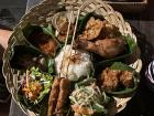 A classic Indonesian meal served on banana leaves