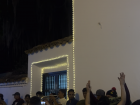 People dancing at the town square with a live band