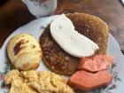 My breakfast in Medellin: eggs, "arepa de choclo" and cheese, papaya, bread and coffee with milk
