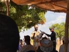 The village chief giving a speech