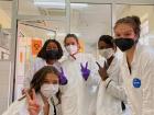 Nicole and I working with the laboratory staff at Queen Elizabeth Central Hospital in 2022