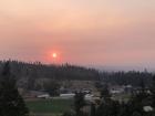 A hazy sunset seen through smoke from the 2022 wildfires