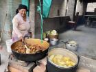 Food is ready! A pork stew with corn on the side.