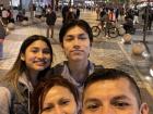This is a picture of my family, including my parents and my sister! We were in Lima, the capital of Peru.