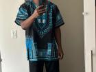 Wearing an African dashiki 