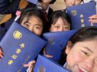 Aisa and her friends celebrating their high school graduation