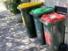 The red bin is for general waste, green is food waste and yellow is recyclable waste