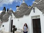 Here I am, resting in front of Trulli houses in Alberobello.