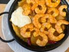 My favorite dish in Seville is papas arrieras, which is a shrimp dish. 