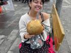 You can find many carts on the street that sell whole coconuts for $2.00