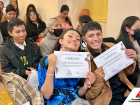 Some students posing with their certificates