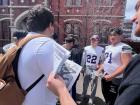 Here is my friend Evan, getting approached by the football team here because they really wanted him to play.