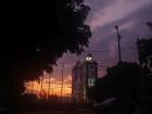 View of a traditional church at sunset in a neighboring town