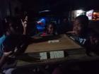 Playing Domino with the neighborhood kids