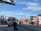 A common bus stop with an uncommon sight. Volcano Santiaguito exploded!