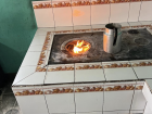 Our wood burning stove with a little carafe of pinol to warm us up