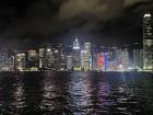 Hong Kong's Victoria Peaks reflected on the water at night.