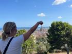 My friend touching the top of the Sagrada Familia (a famous church) after a short hike we did