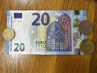 Here is a €20 bill, a €1 coin, a 50 cent coin,and a 10 cent coin