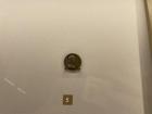 A small medallion of Isabella d'Este, a female art patron 