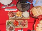 We had fondue with lots of dipping choices, including pickles, ham, bacon, pickled red onions, bread, and potatoes
