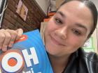Miss Leah with her English teaching book... a fun fact is that students in Argentina learn British English instead of American English!