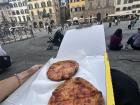 Enjoying mini margherita pizzas in the city center of Florence 