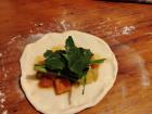 Empanada dough with spinach, potato and carrot filling