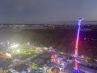 View of the fair and its attractions from the ferris wheel