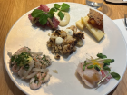 Platter of toppings, like fish, shrimp, cheese and cauliflower, for Smørrebrød
