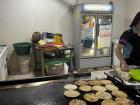 Pupusas being made on a comal