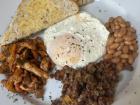 Traditional Botswanan breakfast: eggs, toast, chicken, beef and vegetables