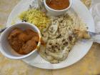 Typical North Indian food: naan, butter chicken, and gobi Manchurian 
