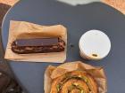 A pistachio pastry and chocolate eclair from France