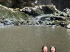 Swimming under a waterfall