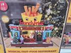 A miniature french fry stand with Christmas decorations