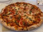 This is a margherita pizza my friends and I ordered while at the beach in Nikiti